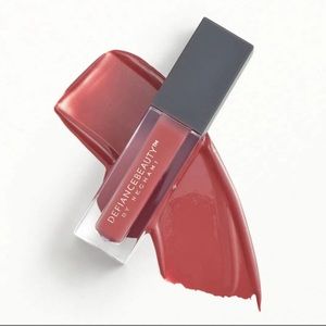 Defiance beauty luminous liquid lipstick in color – warrior